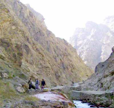 photo by Daud Saba - Southerly view of the Kalu Valley, 20 km to the east of Bamiyan Township, with may hot spring manifestations, seen here to the left of the Kalu River.